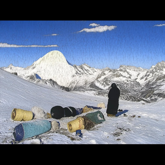 A series of digitally altered paintings inspired by Giovanni Segantini’s work depicting tourists in vast, snowy mountain landscapes. The images feature travelers in dark winter clothing standing or moving among scattered supplies, barrels, and tents, evoking a surreal, painterly aesthetic. The striking contrast between human presence and the untouched grandeur of the high-altitude environment highlights themes of solitude, exploration, and environmental impact.
